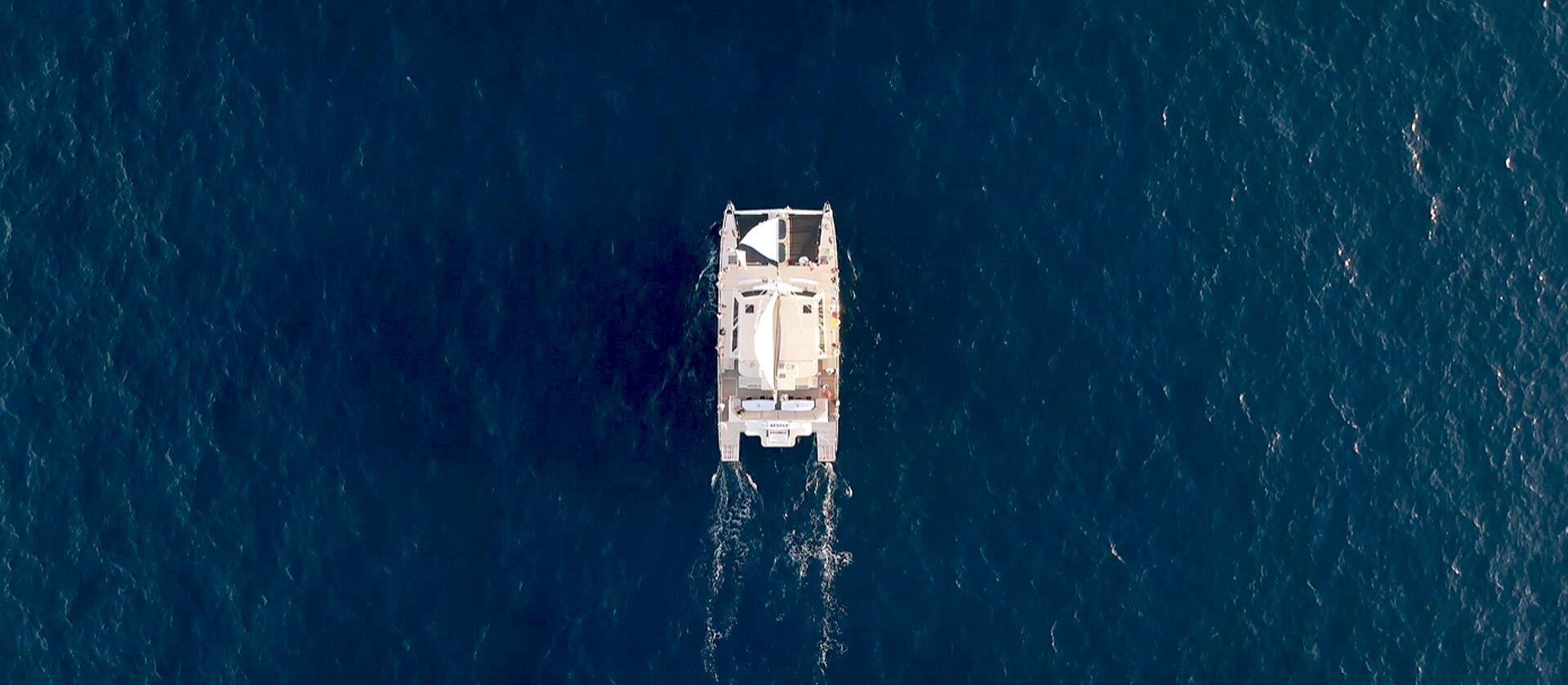 Captain Andy's NaPali catamaran Kauai, the Southern Star, from above.